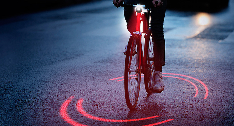 Tecnologia cria círculo de luz vermelha ao redor do ciclista para proteção