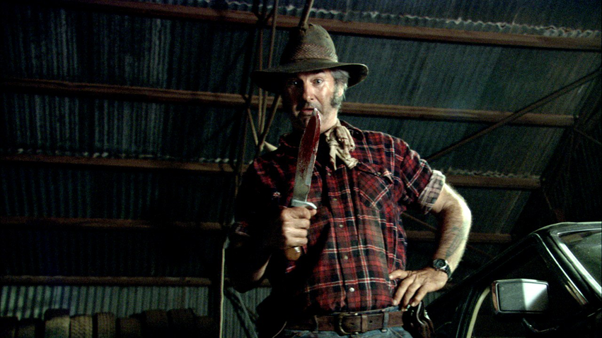 John Jarratt como o assassino Mick Taylor em cena de Wolf Creek 2