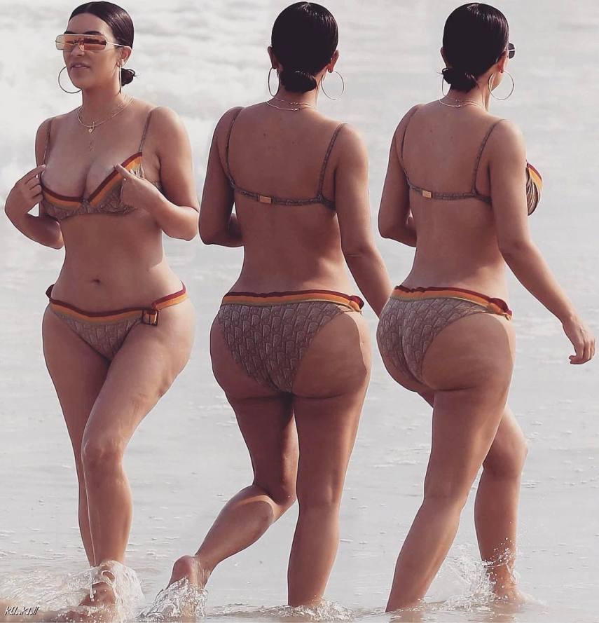 Kim Kardashian curtia uma praia no México quando paparazzi tiraram essas fotos... 
